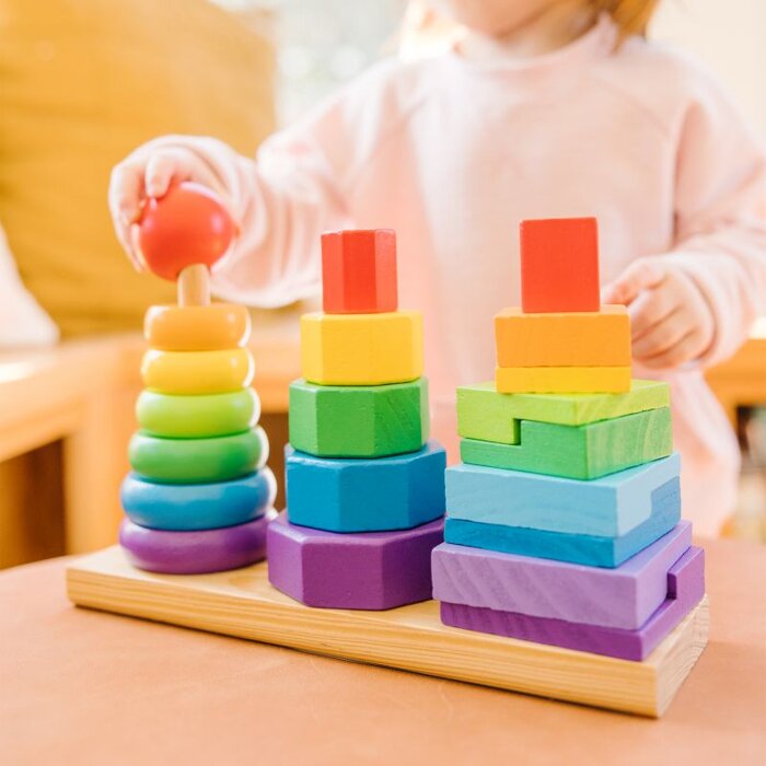 Geometryczna układanka drewniana na palikach pierścienie ośmiokąty prostokąty 21el Melissa & Doug 10567 drewniana zabawka edukacyjna